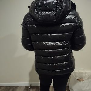Moncler size 4. Long sleeved  & quilted nylon. draw string at detachable hoodie